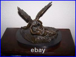 Beautiful bronze statue on marble base classical figures/winged seduction