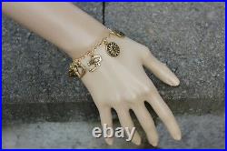 Deluxe Gold Ancient Religions Charm Bracelet -Buddha, Om, Hamsa hand, Angel wing