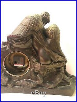 LARGE DARK BRASS TONE RESIN NUDE WOMAN WINGED ANGEL With SHEILD MANTLE CLOCK 16 H