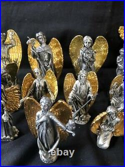 Large Collection of tin angels with gilded wings. Beautiful for christmas