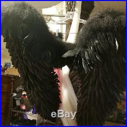Large angel wings for photo shoot. They see hand made black angel wings for adul