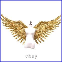 Large performance props display golden feather angel wings