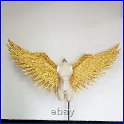 Large performance props display golden feather angel wings