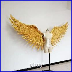 Large performance props display golden feather angel wings