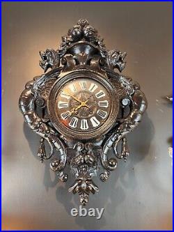 Late 19th Century Highly Carved French Renaissance Revival Ebonized Wall Clock