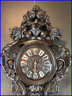 Late 19th Century Highly Carved French Renaissance Revival Ebonized Wall Clock