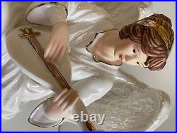 O'well Angel set of 2 from 2000. Iridesent wings, gold trimming, sundial, bird