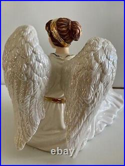 O'well Angel set of 2 from 2000. Iridesent wings, gold trimming, sundial, bird